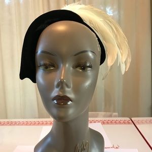 60's black velvet hat with a white feather